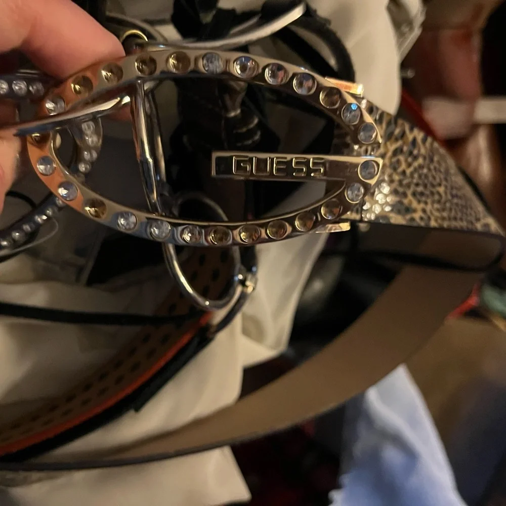 Guess Genuine Leather animal print size 1.5” silver hardware G w/rhinestones